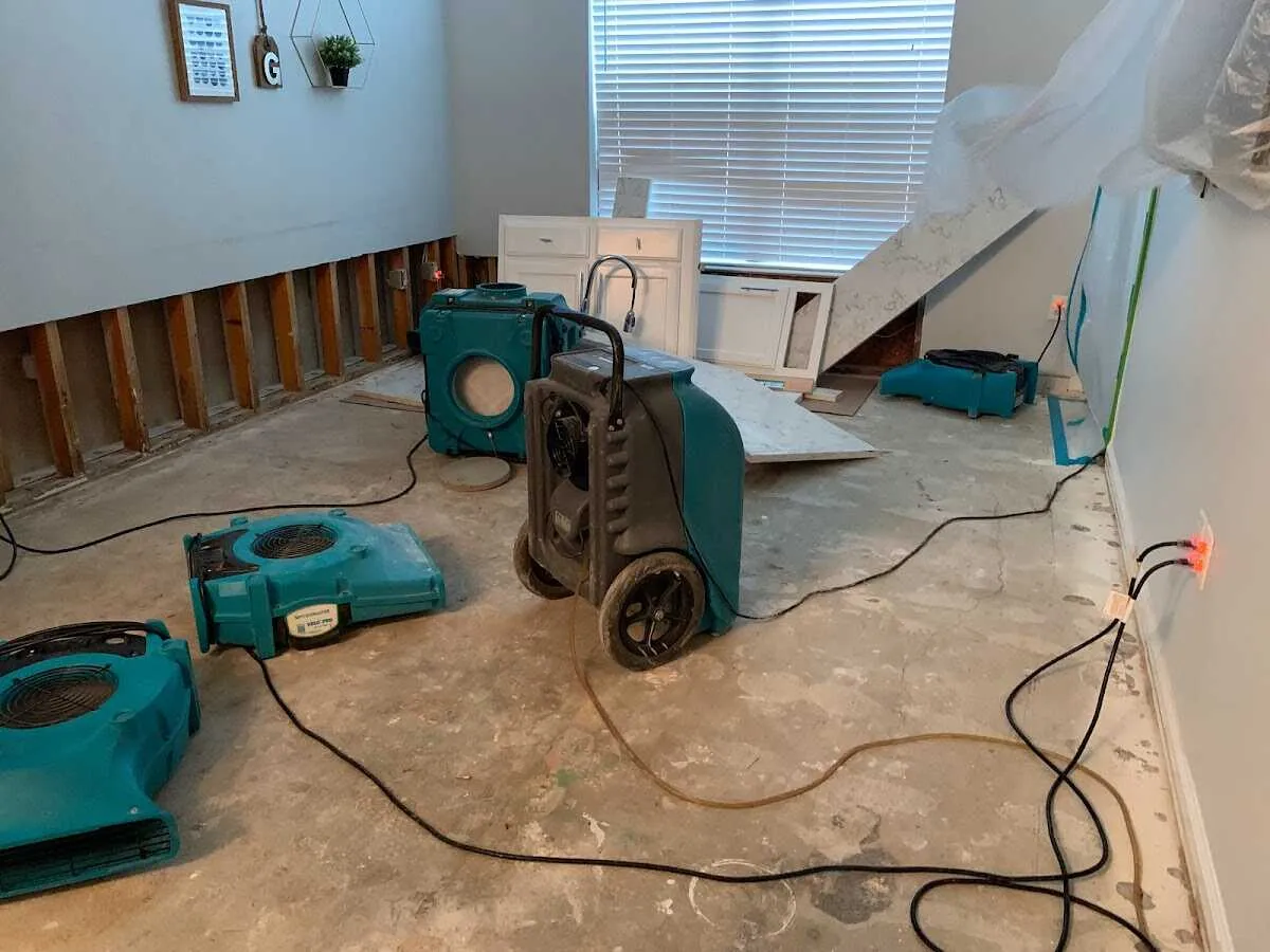 Dehumidifier in flood-cut room for Water Damage Restoration in Riverton